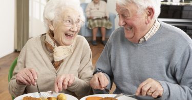 Senior Couple Enjoying Meal Together