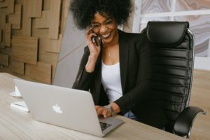 woman at computer setting up an llc