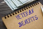Financial concept meaning VETERAN BENEFITS with inscription on t