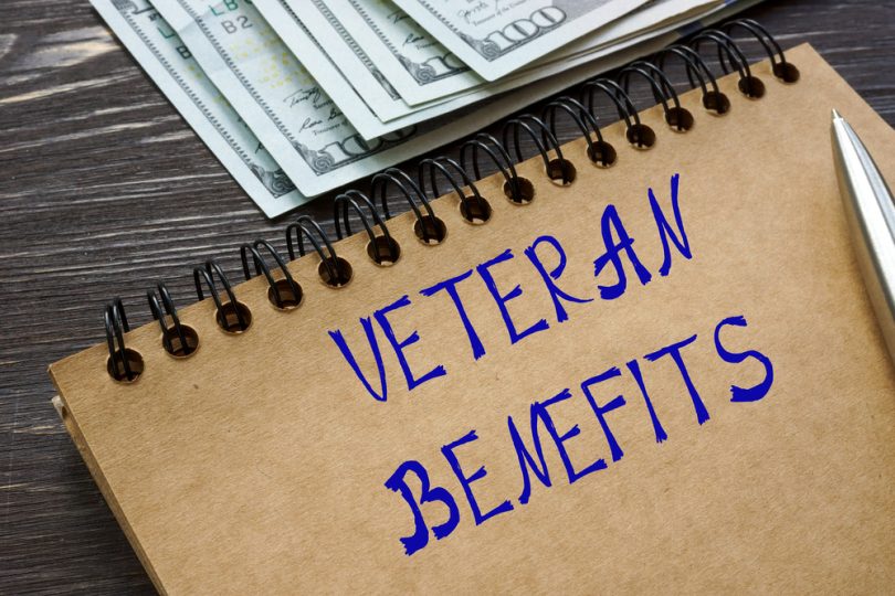 Financial concept meaning VETERAN BENEFITS with inscription on t